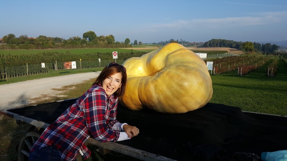I look pretty excited about this pumpkin.Its the biggest in Switzerland.. (but I am sure Canada has bigger (; 